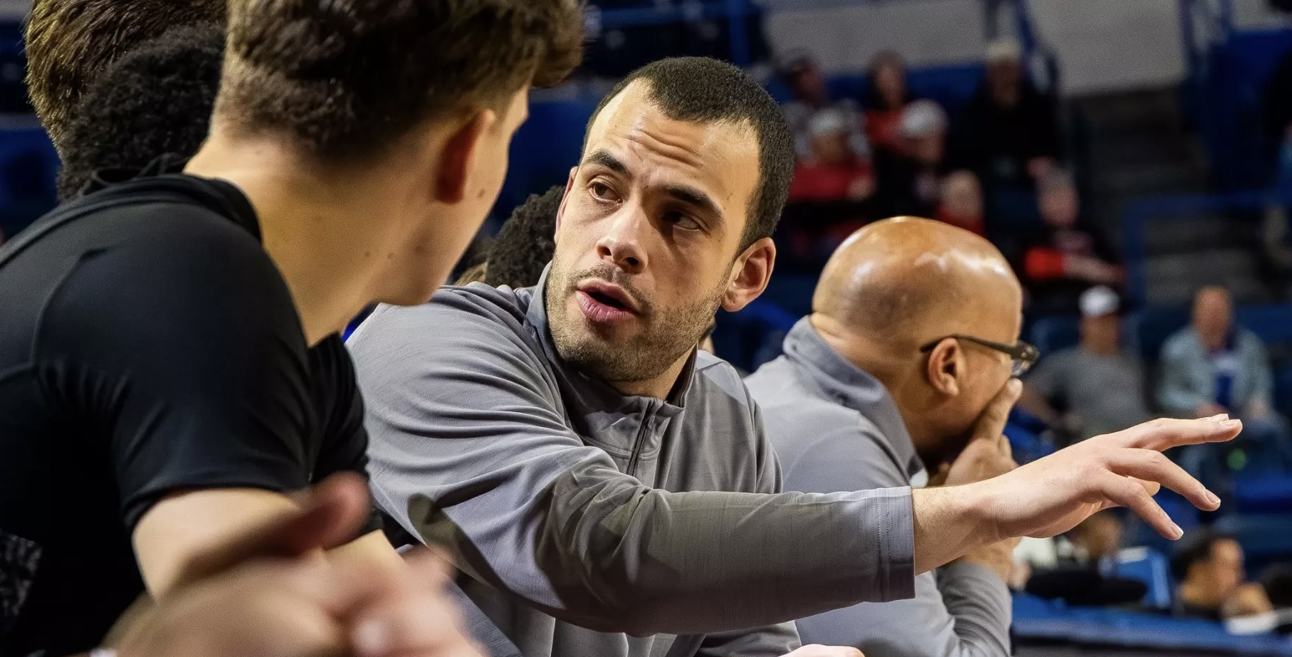 Sid Tomes coaching at the bench